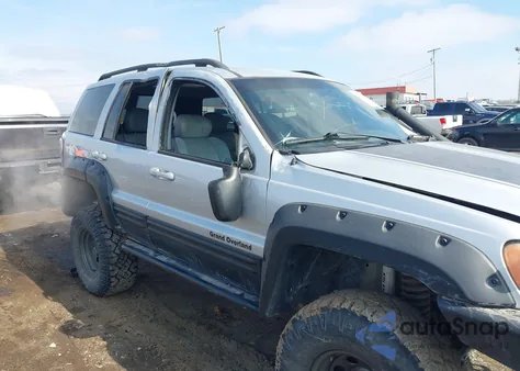 2003 Jeep Grand Cherokee Overland z USA, uszkodzony, nr VIN 1J8GW68JX3C501521